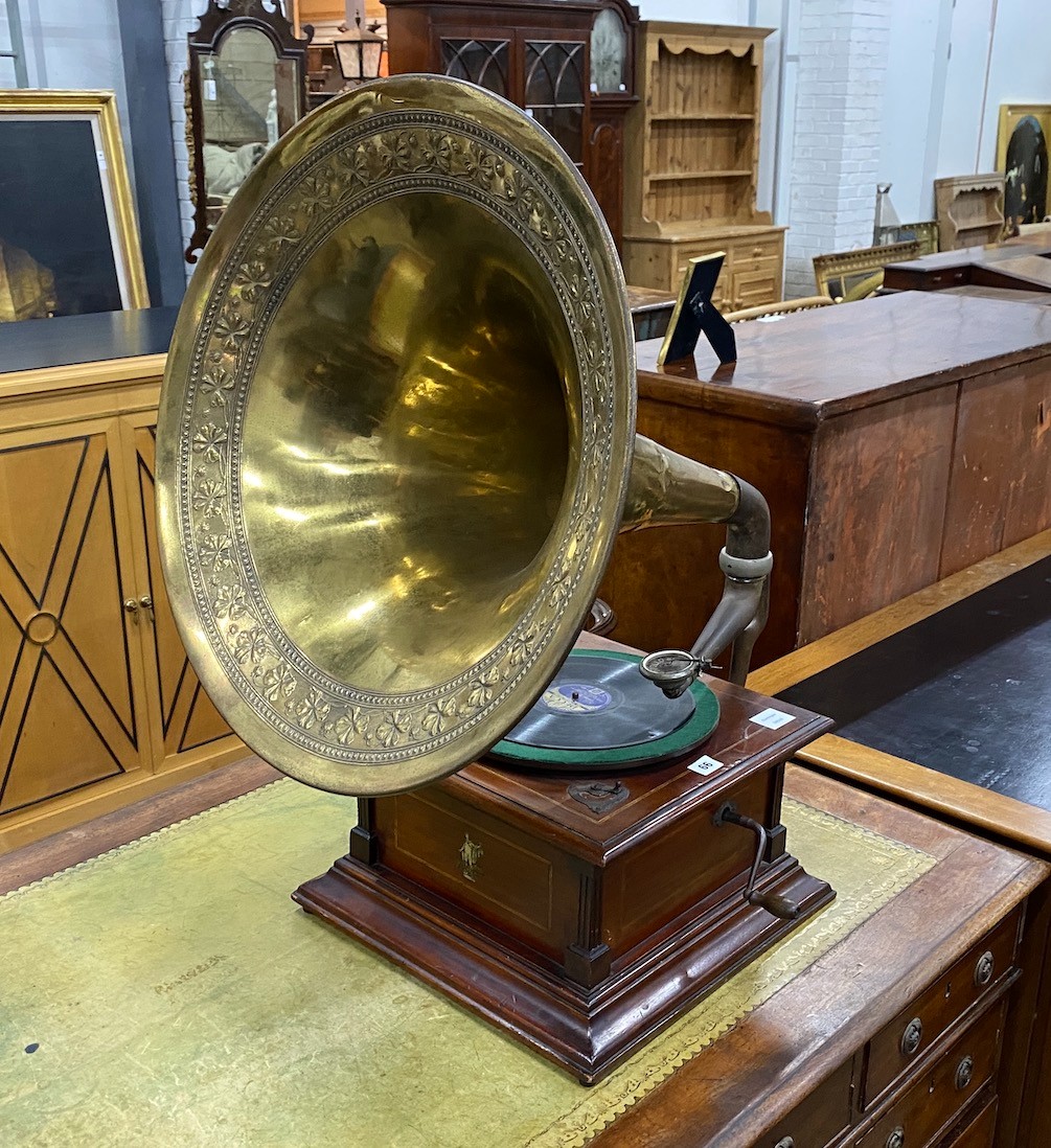 An early 20th century Apollo mahogany gramophone with brass horn, height 86cm